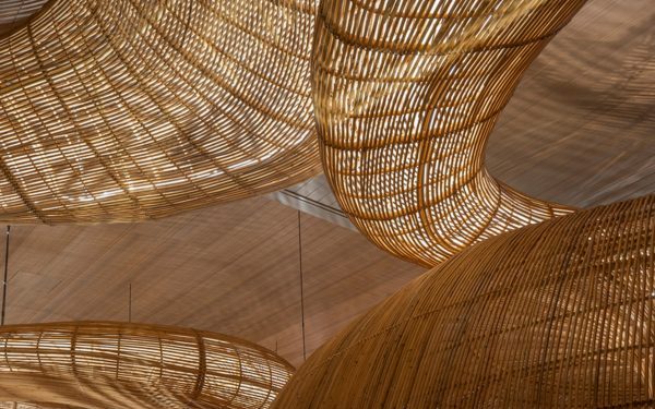 Rattan set up meanders by means of Thai artwork gallery by Enter Initiatives Asia