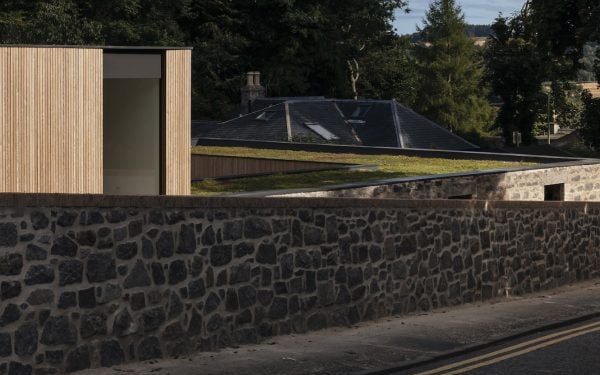 Brown & Brown makes use of reclaimed stone to create The Arbor Home